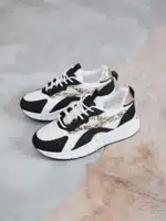 Baskets femme tendance en noir et blanc avec finitions léopard | Lila & Zoé